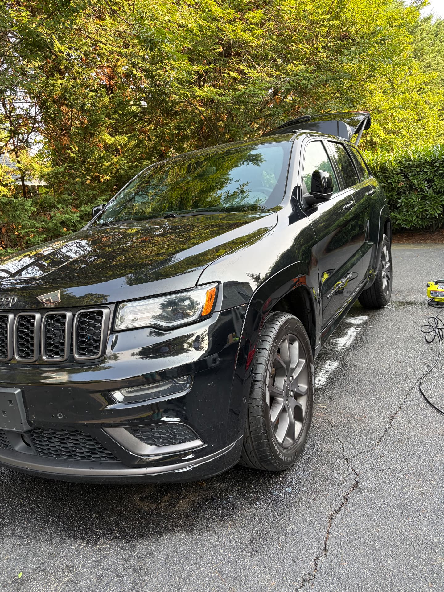 Black Jeep Grand Cherokee after a hand wash and wax